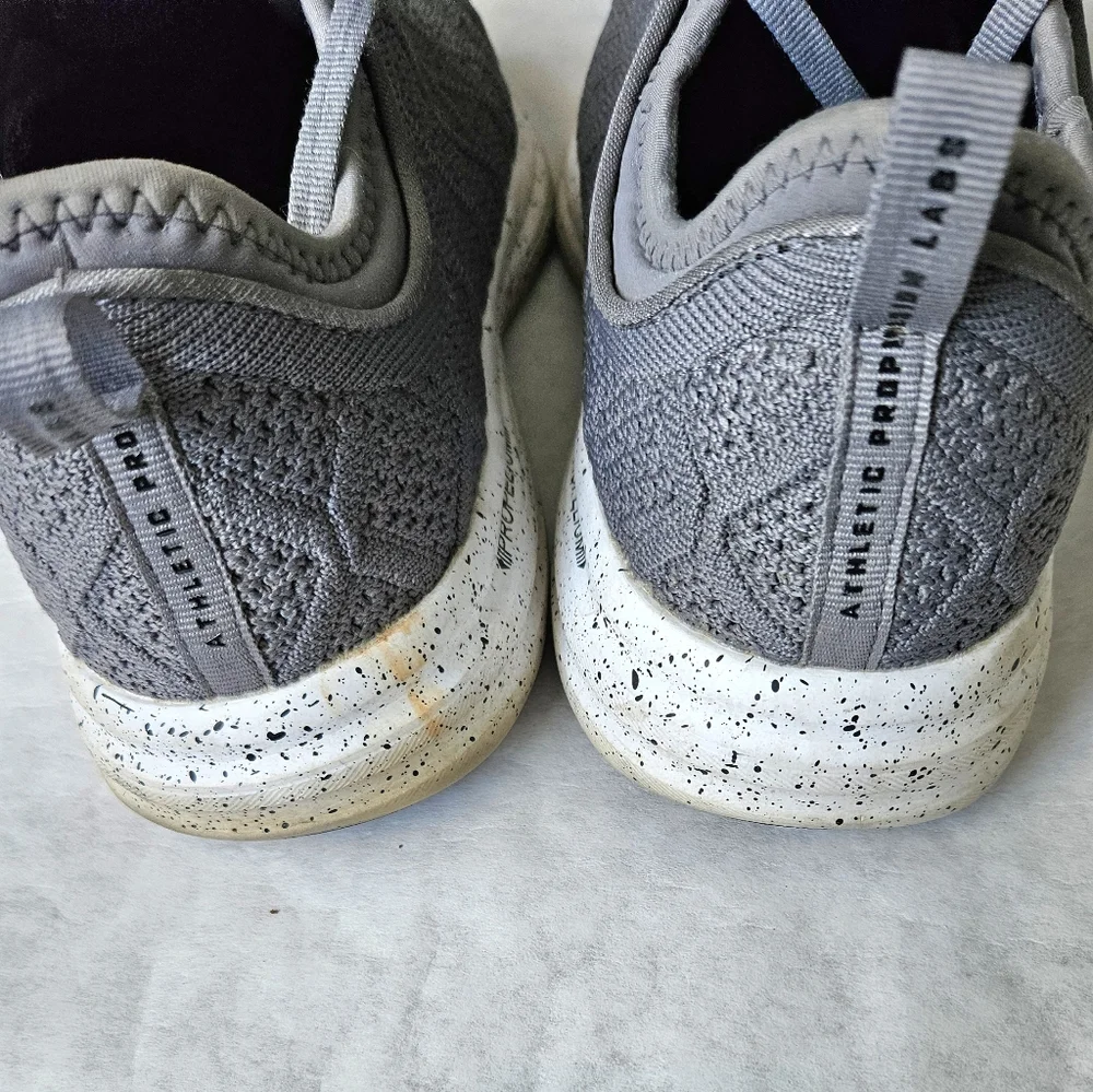 APL Phantom gray running shoes speckle soles